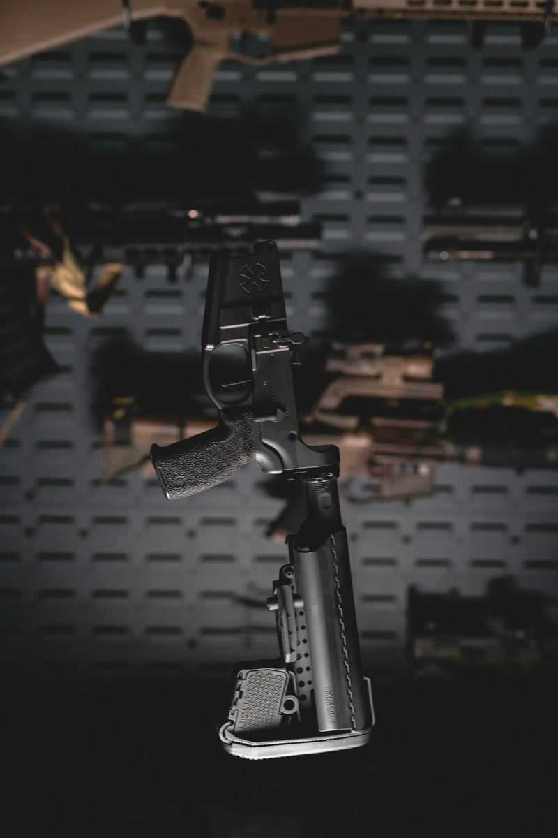Rifles displayed on a shop wall