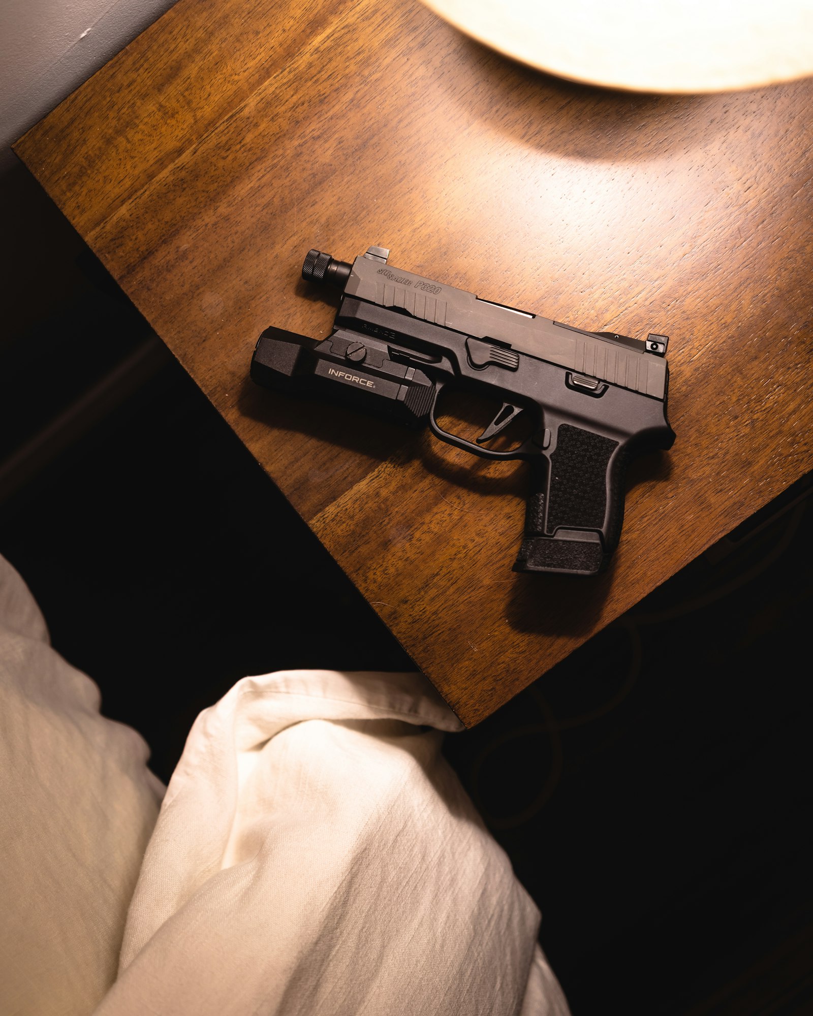 Detail of handgun controls and fit