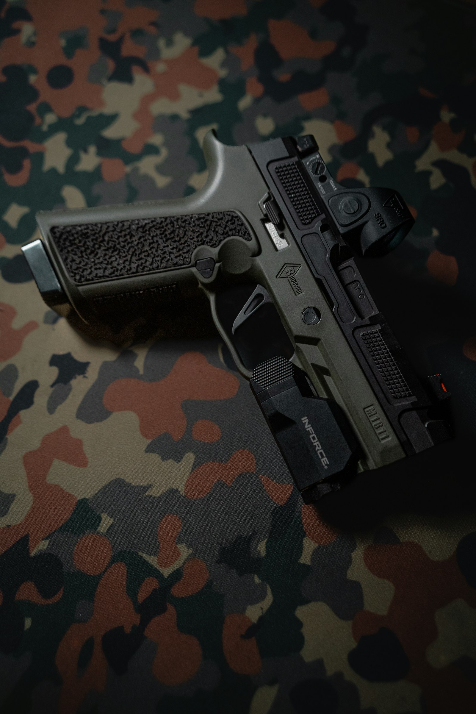 A handgun as part of a broader system